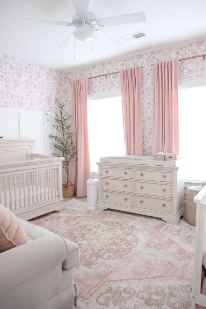 fancy wall and floor nursery in pink, white and grey