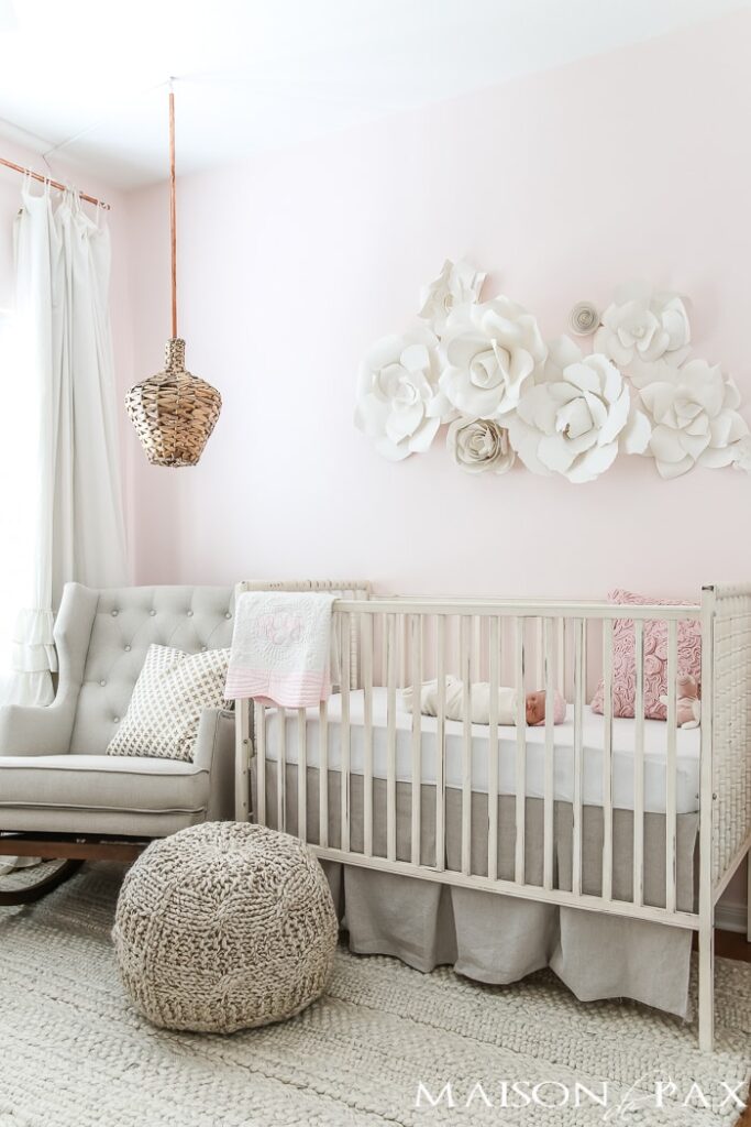 neutral shades of pink white and grey in the nursery